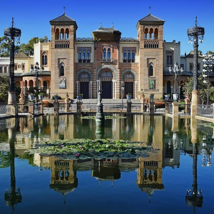 The Mudéjar Pavilion and its reflection in the pond at the María Luisa park